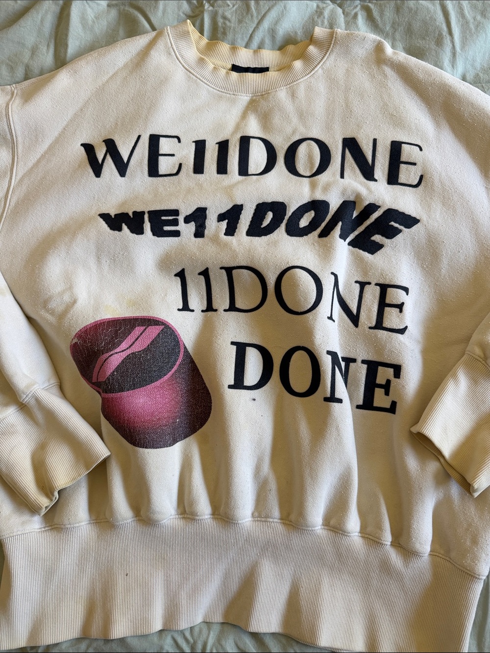 Cream Crewneck Sweatshirt with Pink Graphic